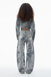 Alexander Wang washed smoke white low-rise flocked jeans with lasered cloud print