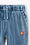 alexander wang pantalon de survêtement en velours avec logo en relief washed bluestone