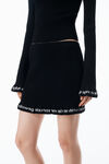 Alexander Wang black long-sleeve ruffle-hem turtleneck
