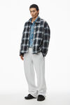 Alexander Wang light heather grey pantalon de survêtement oversize avec logo brodé en éponge de coton épais