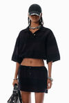 Alexander Wang black overdyed stripe schwarz gestreiftes poloshirt aus pikee