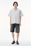Alexander Wang light heather grey polo gris clair en piqué à rayures