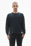 Alexander Wang washed black langarmshirt aus baumwollstretch in waffelstrick