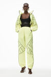 alexander wang sculpted piping track shrug in nylon glowstick