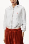 alexander wang apple logo shrunken hoodie in terry light heather grey