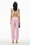 alexander wang puff logo sweatpants in terry soft candy pink
