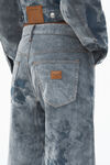 Alexander Wang washed smoke white low-rise flocked jeans with lasered cloud print