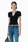 Alexander Wang black schwarzer pullover mit logoschild