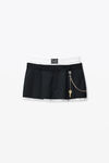Alexander Wang black/white minigonna nera con design integrato e dettagli in metallo
