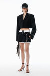 Alexander Wang black/white minigonna nera con design integrato e dettagli in metallo