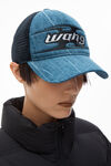 Alexander Wang tumbled medium indigo blade logo-embroidered trucker hat in cotton