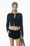 Alexander Wang washed black organic cotton cable-knit cropped cardigan