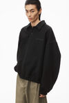 Alexander Wang black puffed logo oversized polo top in cotton