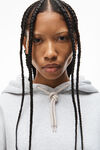 alexander wang puff logo hoodie in structured terry light heather grey