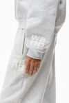 alexander wang puff logo hoodie in structured terry light heather grey