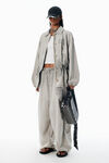 Alexander Wang stone grey parachute pants with logo print