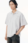 Alexander Wang light heather grey polo gris clair en piqué à rayures