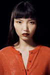 Alexander Wang fiery red cardigan à col rond orné de perles transparentes thermocollées