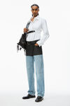 alexander wang überlange denim-jeans mit lederpartie vintage faded indigo