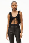 HIGH-WAISTED PANT IN LEATHER AND JERSEY